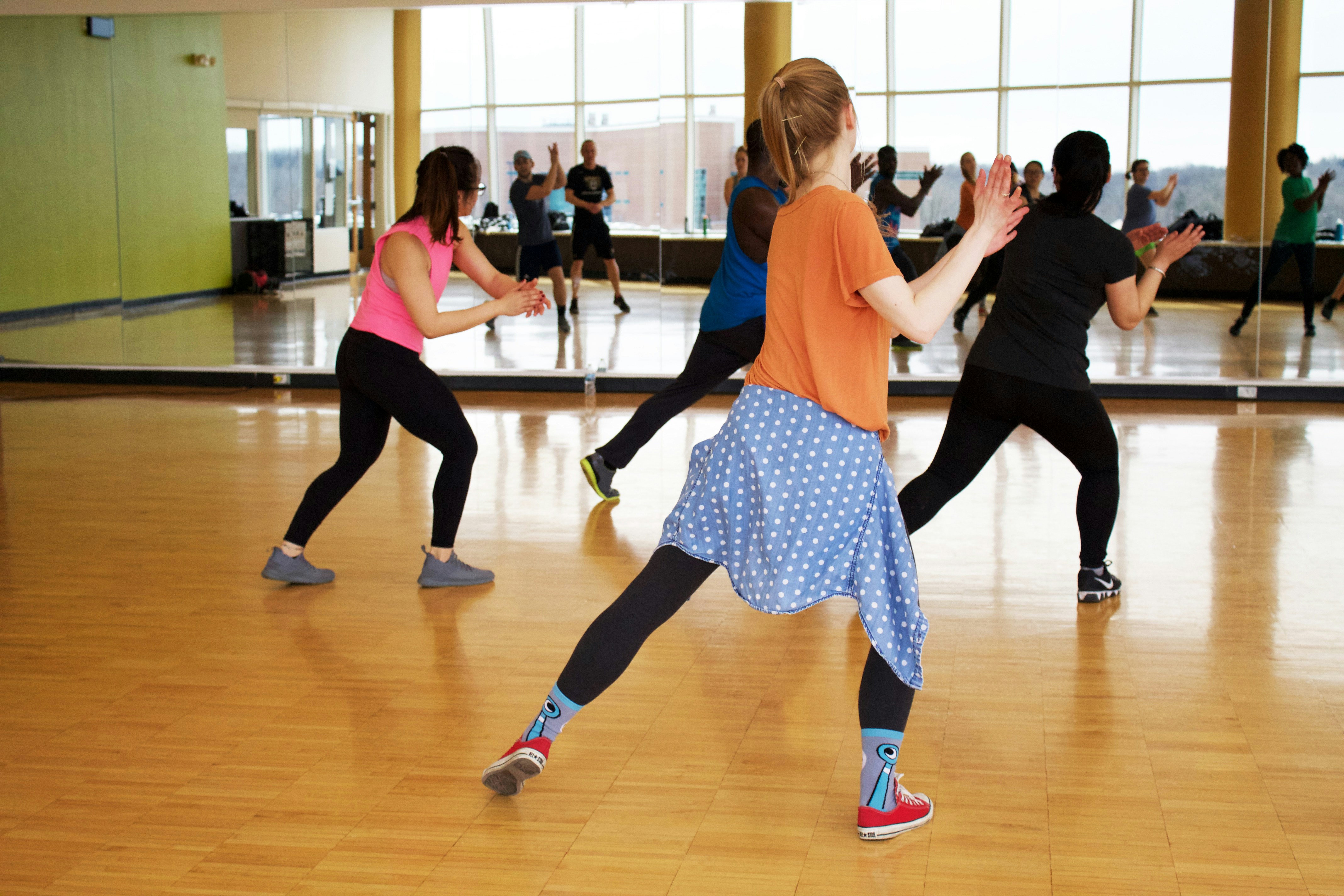 Dancer using a mirrored dance video to learn choreography correctly
